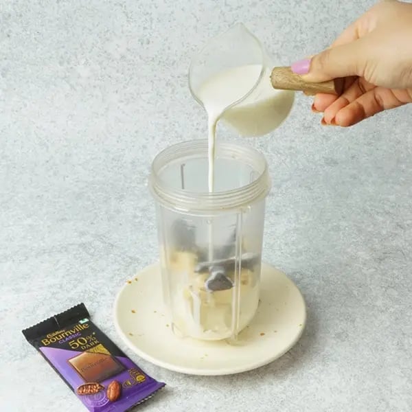 Bournville Soan Papdi Pistachio Milkshake-Pour in the desired amount of milk