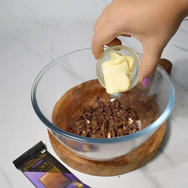 Bournville Sour Cream Chocolate With Pistachio - Place butter in chopped chocolate