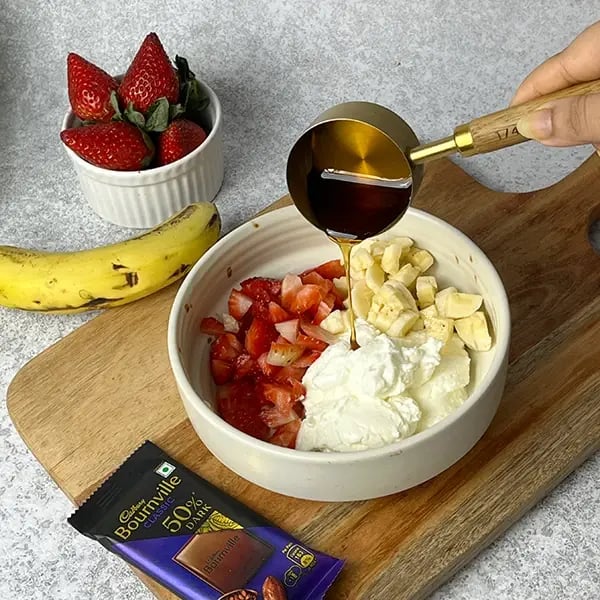 Bournville Strawberry Banana Yogurt Cluster -In a medium sized bowl