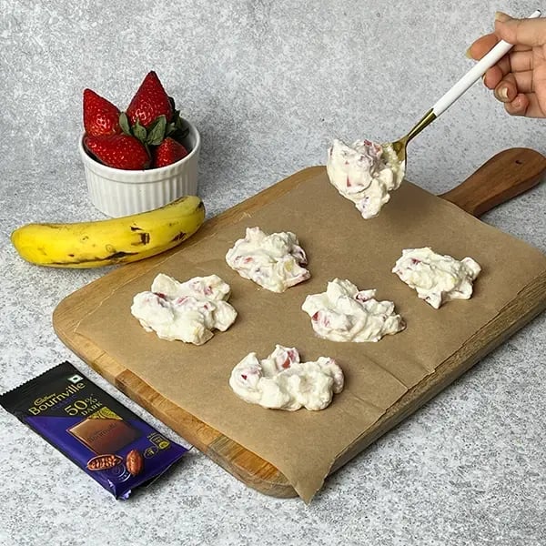 Bournville Strawberry Banana Yogurt Cluster -Add 2 scoops of yogurt mixture