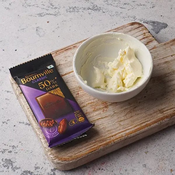 Bournville Strawberry Cheese Bite - Cream cheese in a mixing bowl