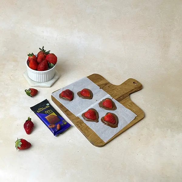 Bournville Strawberry Chocolate Heart - Dip the strawberry hearts into the melted chocolate