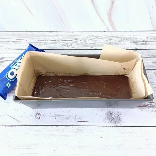 Brownie Bars with Ice Cream and Oreo Topping - Pour the batter into a baking tray