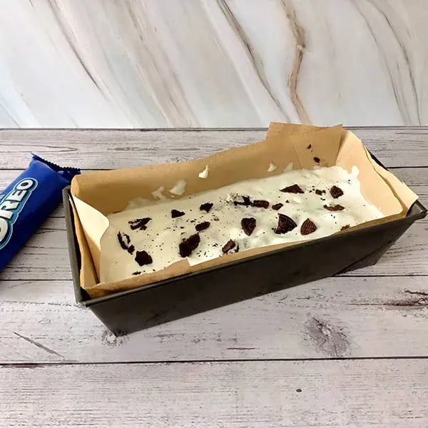 Brownie Bars with Ice Cream and Oreo Topping - Freeze until completely set