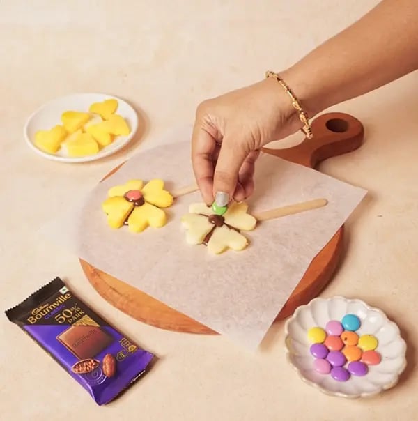 Cadbury Bournville and Fruit Flowers-Place a small drop of melted chocolate