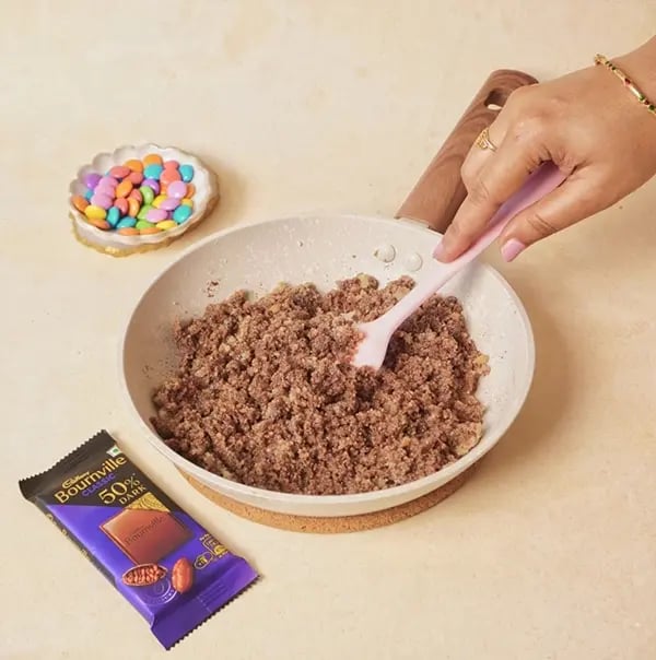 Cadbury Bournville Flower Sondesh with Gems-Stir immediately and mix well