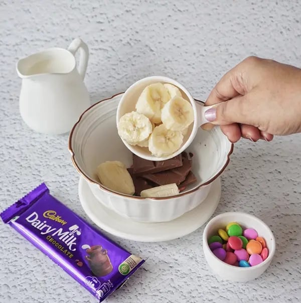 Cadbury Dairy Milk and Gems Milk Shake-Add chopped banana