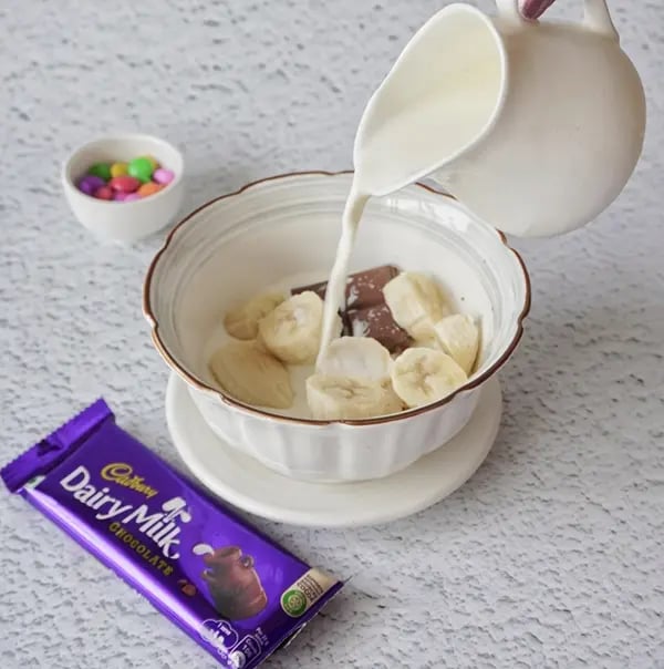 Cadbury Dairy Milk and Gems Milk Shake-Pour in the milk