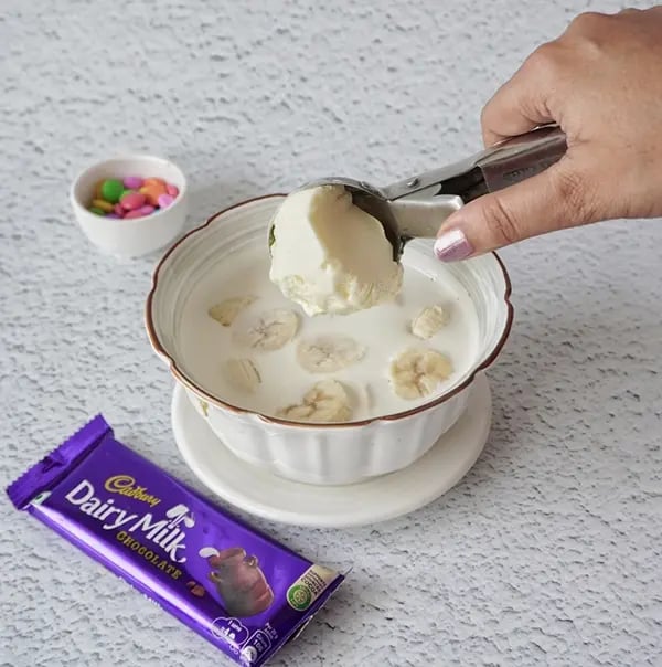 Cadbury Dairy Milk and Gems Milk Shake-Add 2-3 scoops of ice cream