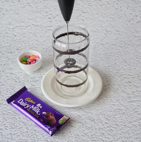 Cadbury Dairy Milk and Gems Milk Shake-Drizzle some melted chocolate
