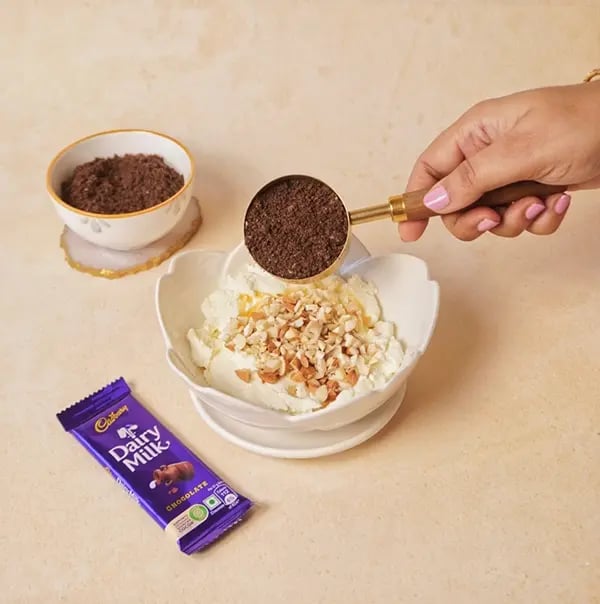 Cadbury Dairy Milk Chocolate Yogurt Bombs-Gently add the crushed Oreo cookies