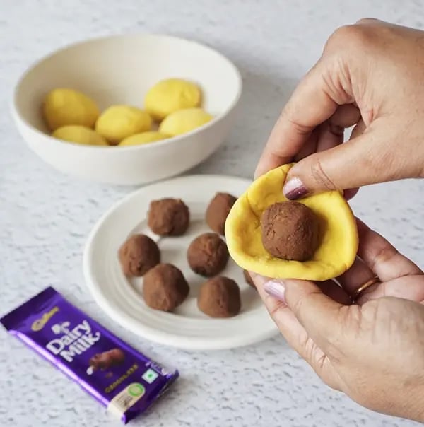 Cadbury Dairy Milk Puran Poli with Cashews and Almonds - Flatten one dough ball