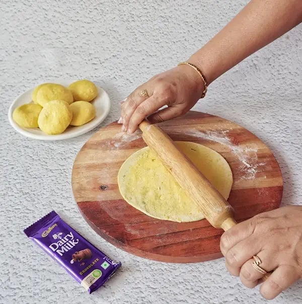 Cadbury Dairy Milk Puran Poli with Cashews and Almonds - Gently roll out into a thin disc