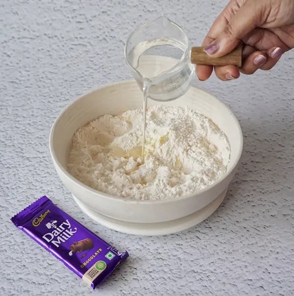 Cadbury Dairy Milk Puran Poli with Cashews and Almonds - Add water little by little
