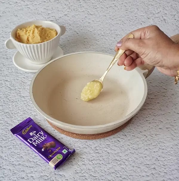 Cadbury Dairy Milk Puran Poli with Cashews and Almonds - Heat ghee in a pan