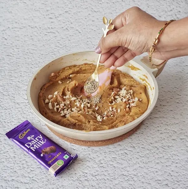 Cadbury Dairy Milk Puran Poli with Cashews and Almonds - Add cardamom, chopped cashews and almond