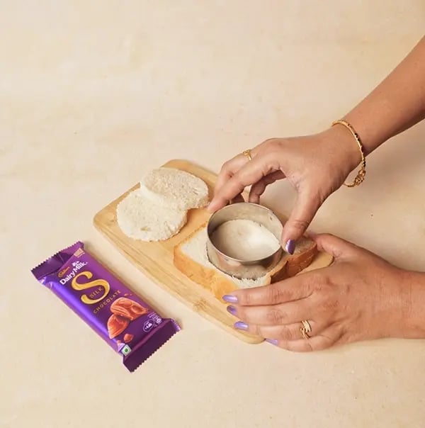 Cadbury Dairy Milk Silk Chocolate Cake with Bread slices-Take 3–4 slices