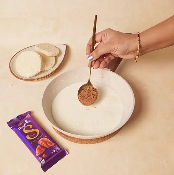 Cadbury Dairy Milk Silk Chocolate Cake with Bread slices-Now add 1 to 2 tablespoons
