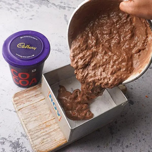 Carrot Banana Cake - Pour it into greased cake tin