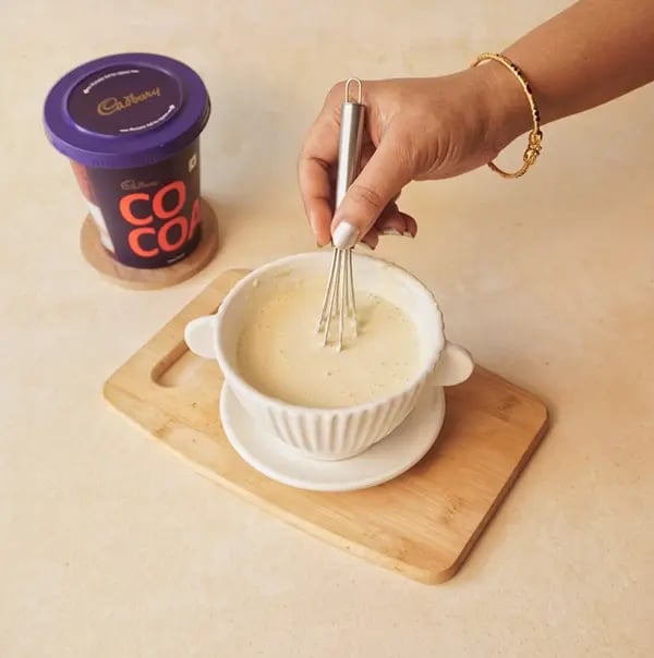 Cheesecake Brownie-Add the powdered sugar