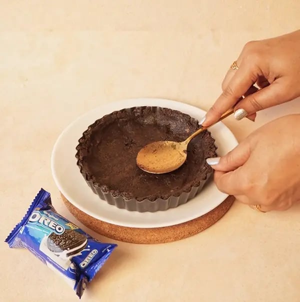 Cherry Pie with Oreo Crust and Cashew Topping-Press the mixture firmly