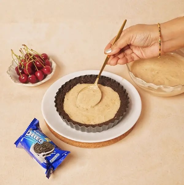 Cherry Pie with Oreo Crust and Cashew Topping-Pour the cherry mixture