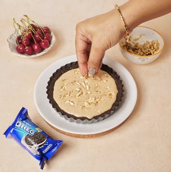 Cherry Pie with Oreo Crust and Cashew Topping-Sprinkle the cashew mixture