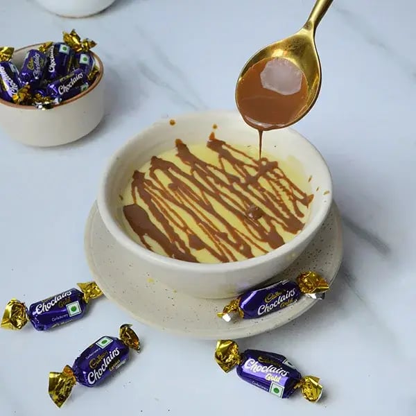 Choclairs drizzle in creamy custard pudding - Pour melted chocolate