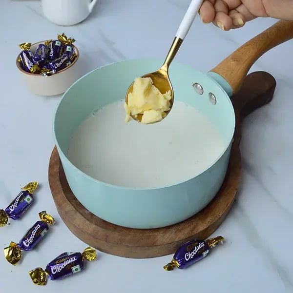 Choclairs drizzle in creamy custard pudding - Add unsalted butter