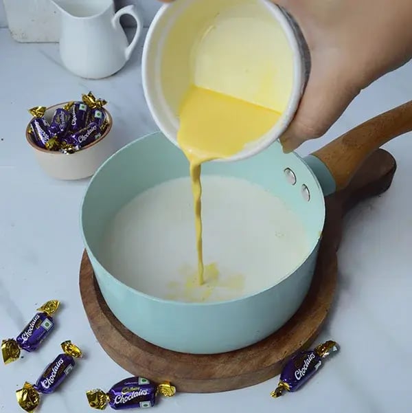 Choclairs drizzle in creamy custard pudding - Whisk continuously