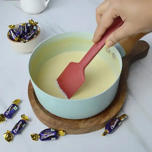 Choclairs drizzle in creamy custard pudding - Keep stirring