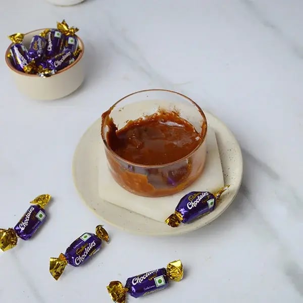 Choclairs drizzle in creamy custard pudding - Mix the melted chocolate
