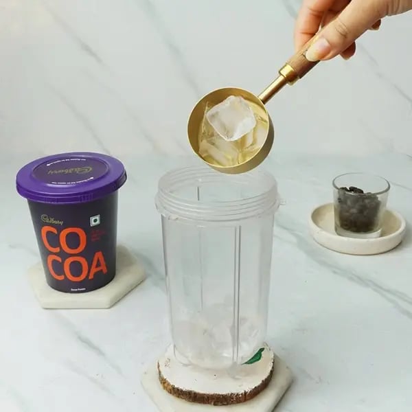 Choco-Mocha Frappe Cafe Style - Few ice cubes into a blending jar
