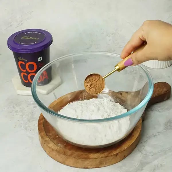 Choco Orange Cake With Hazelnut Garnish - Add Cadbury cocoa powder
