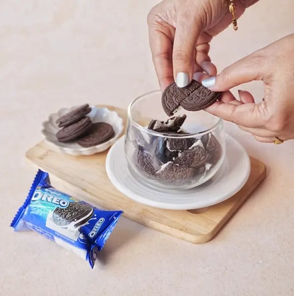 Chocolate and Oreo Fruit Parfait-In a bowl break the Oreo cookies