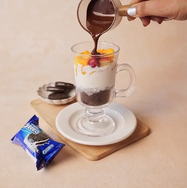Chocolate and Oreo Fruit Parfait-Drizzle melted chocolate over the fruit