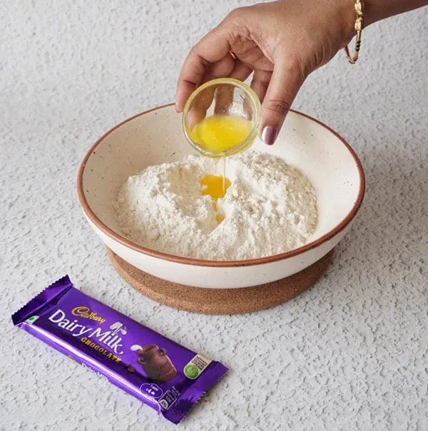 Chocolate Baked Gujiya With Dry Fruits &amp; Coconut - Combine maida (all-purpose flour), ghee