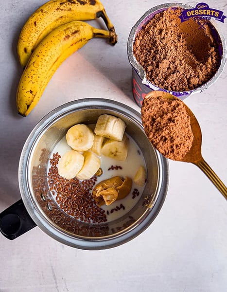 Chocolate Banana Smoothie Recipe - Pouring Milk Into Blender