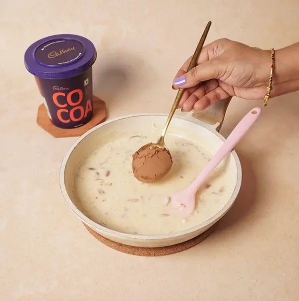 Chocolate Basundi with Mango-Divide the prepared basundi