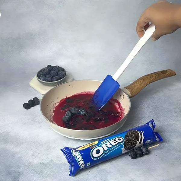 Chocolate Blueberry Yogurt With Oreo Crust-Heat the blueberries in a small pan