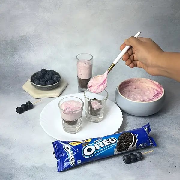 Chocolate Blueberry Yogurt With Oreo Crust-Pour blueberry yogurt into the glass