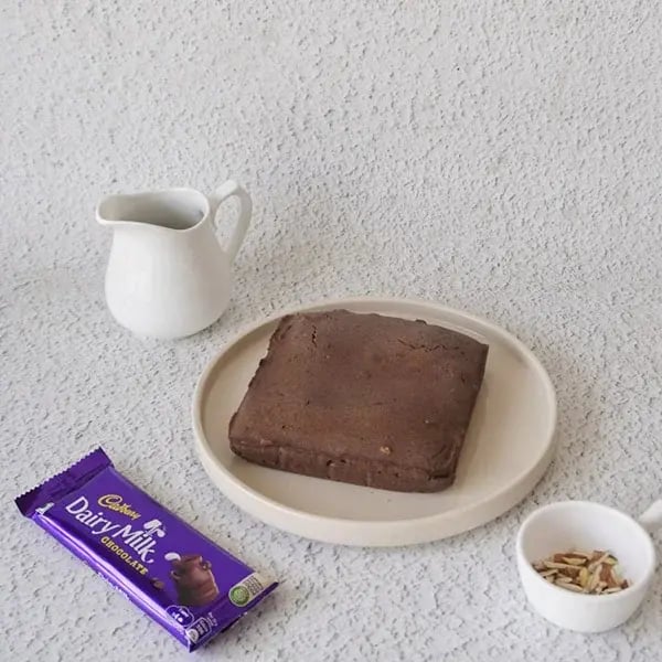 Chocolate Brownie Cake with Nuts - Pour the sauce over the brownie