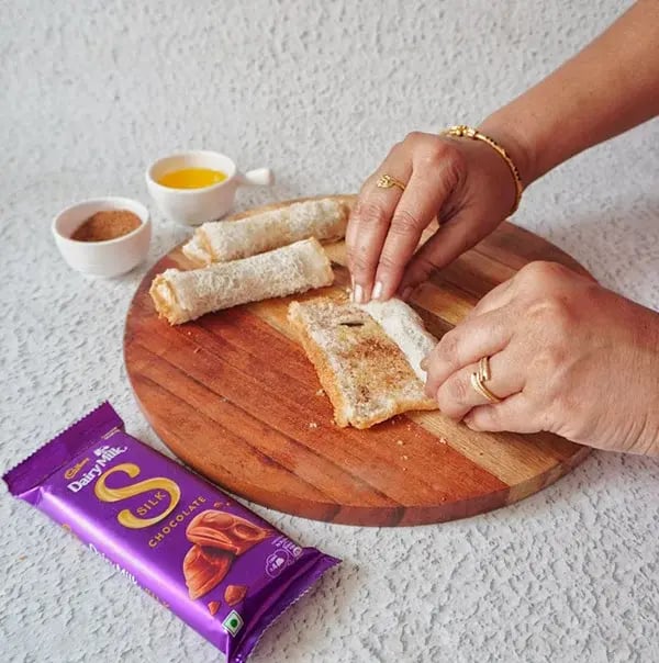 Chocolate Coated Bread Roll - Carefully roll