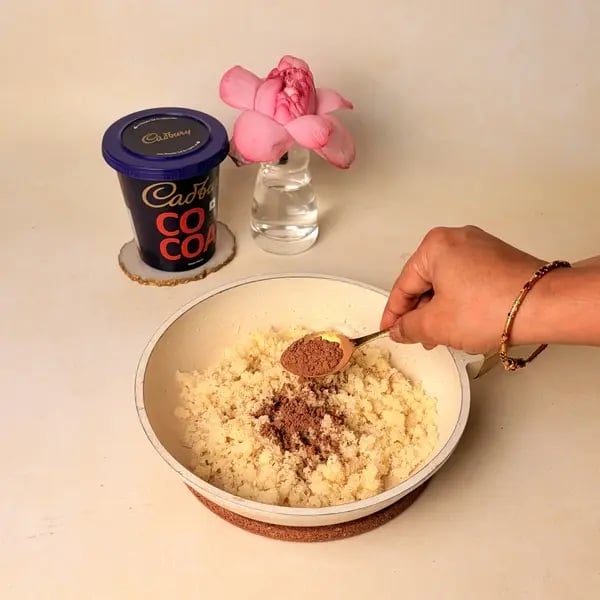 Chocolate Coconut Modak With Cadbury Cocoa Powder For Ganpati Bappa - Adding Cocoa Powder