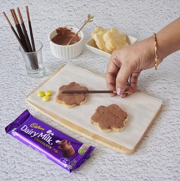 Chocolate Daisy Sandwich Appetizers with Gems - Place a Pocky stick at the base