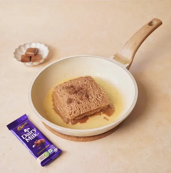 Chocolate French Toast with Cadbury Dairy Milk-Heat some butter in a pan