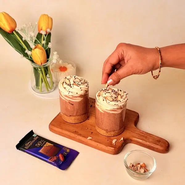 Chocolate Khoya Kheer Cheesecake Cups: A Creamy Indian Fusion Dessert For Navratri - Sprinkling Chopped Almonds