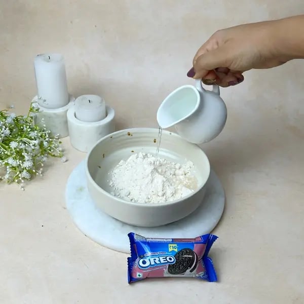 Chocolate Oreo Poke Cake - Whisking Cake Mix