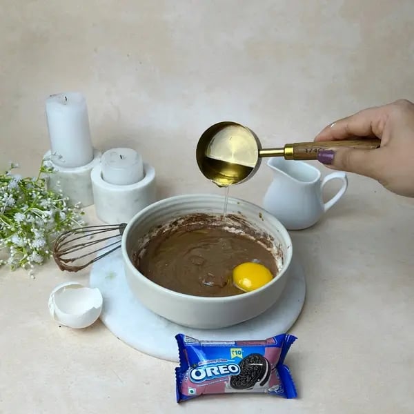 Chocolate Oreo Poke Cake - Adding Oil And Eggs