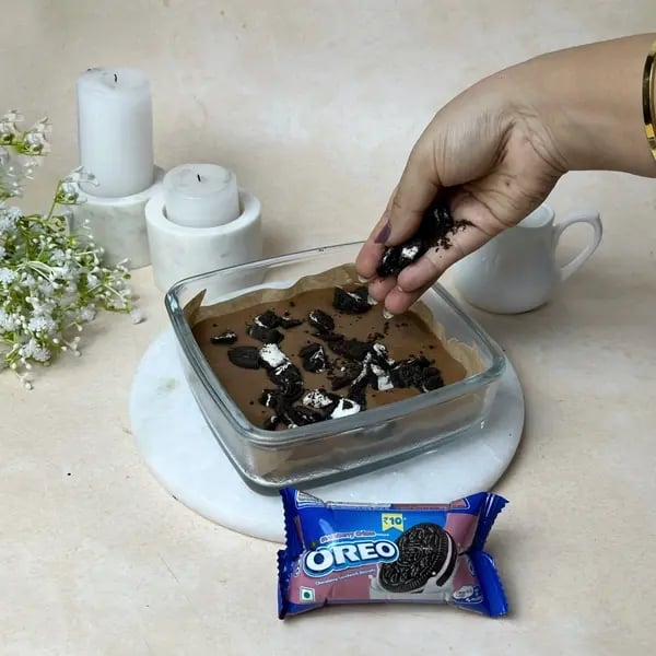 Chocolate Oreo Poke Cake - Mixing Cake Batter